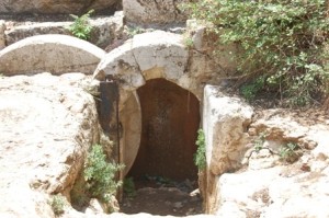 At the entrance to the cave one finds a complete rolling stone. These stones would block the entrance to the cave and could be rolled back when needed. The use of rolling stones (called: golel) and family burial caves was very common among the Jews of Jerusalem, especially during the Second Temple Period. (Cf. Matthew, 28:2).  Picture Credit: Segula Magazine 